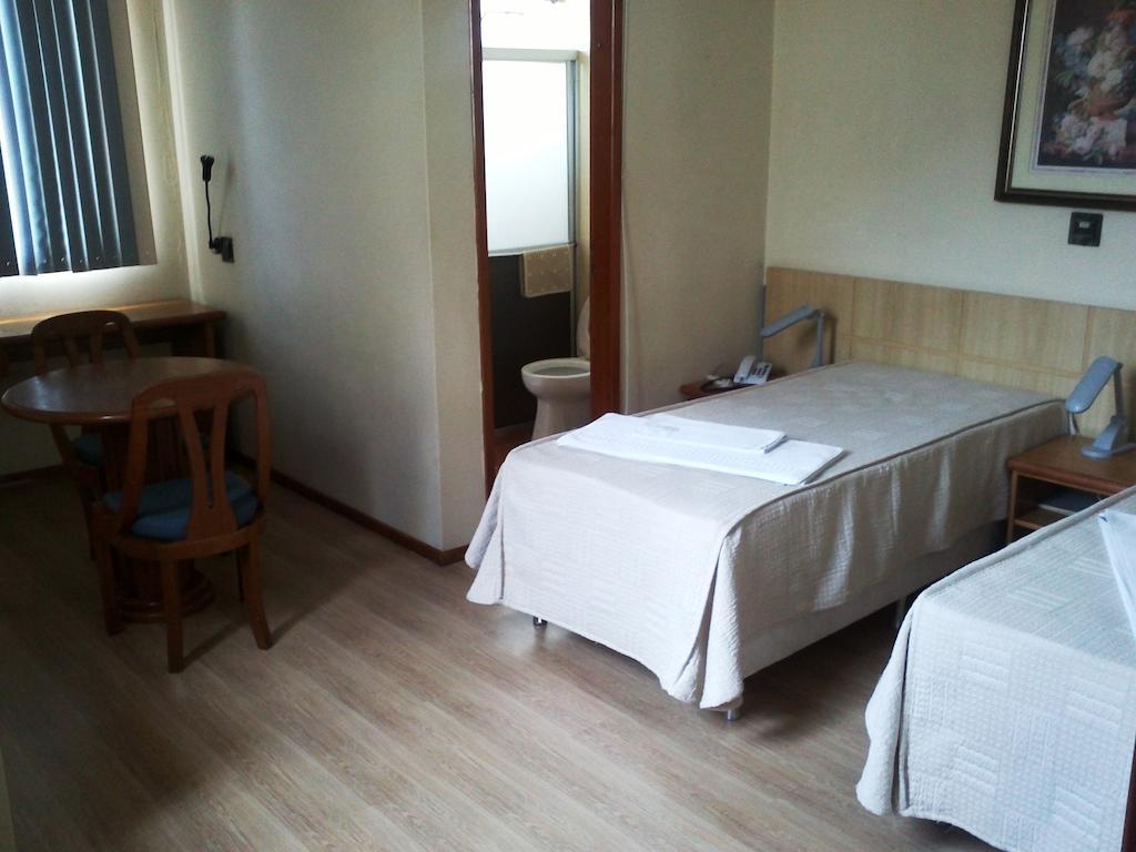 Quarto Duplo