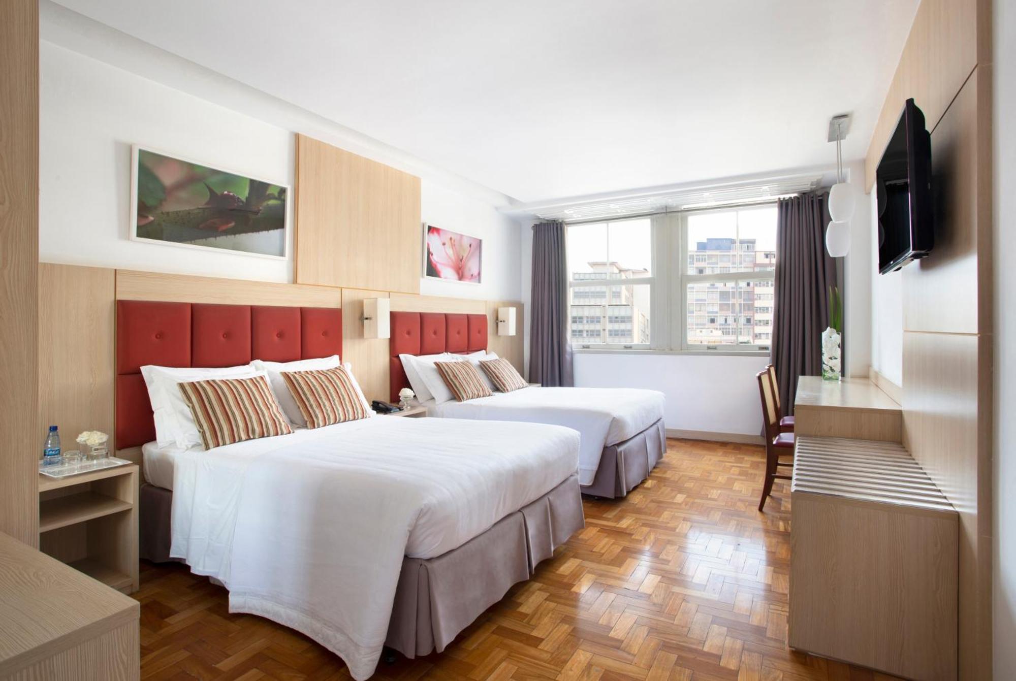 Quarto Quádruplo Premium