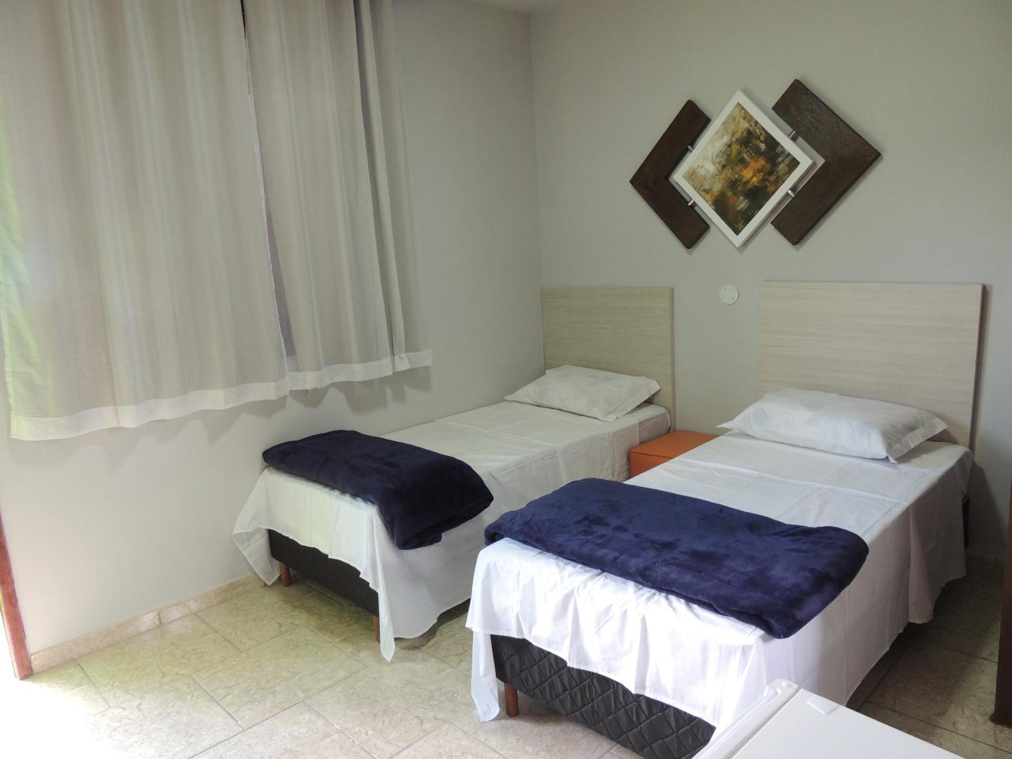 Quarto Deluxe com 2 Camas de Solteiro